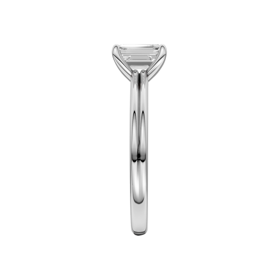 A side view of the Emerald cut diamond engagement ring in 14k white gold with a plain band and solitaire setting