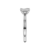 A side view of the Emerald cut diamond engagement ring in 14k white gold with a plain band and solitaire setting