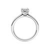 A profile view of the Emerald cut diamond engagement ring in 14k white gold with a plain band and solitaire setting