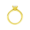 A profile view of the Marquise cut diamond engagement ring in 14k yellow gold with a plain band and solitaire setting