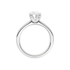 A profile view of the Oval cut diamond engagement ring in 14k white gold with a plain band and solitaire setting