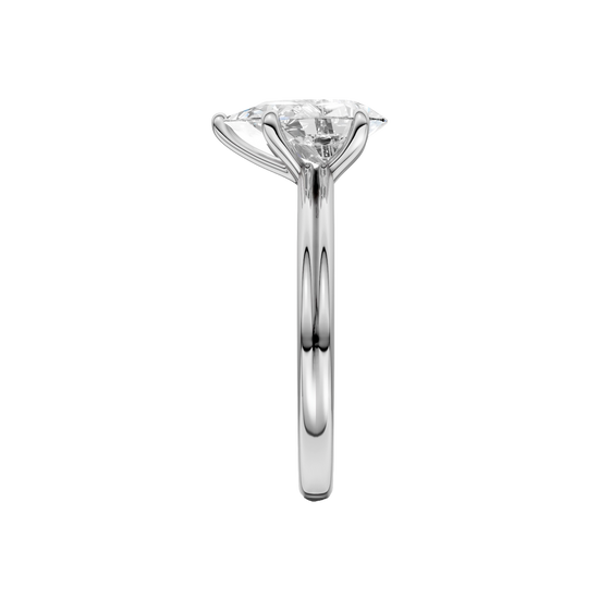 A side view of the Pear cut diamond engagement ring in platinum with a plain band and solitaire setting