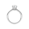 A profile view of the Pear cut diamond engagement ring in 14k white gold with a plain band and solitaire setting