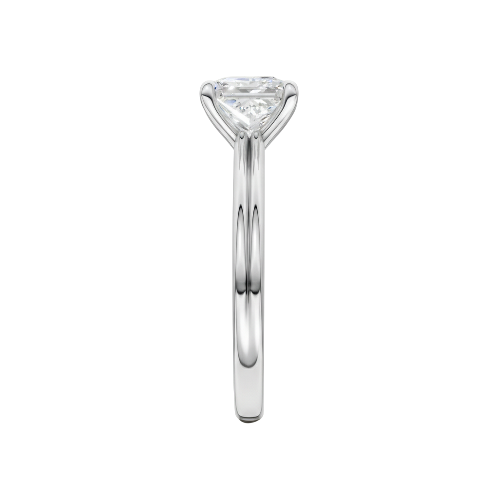A side view of the Princess cut diamond engagement ring in platinum with a plain band and solitaire setting
