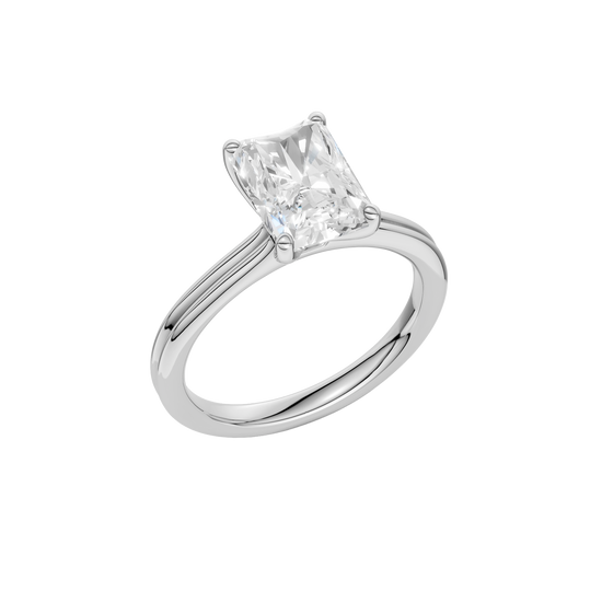 A three-quarter view of the Radiant cut diamond engagement ring in platinum with a plain band and solitaire setting
