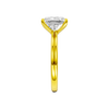 A side view of the Radiant cut diamond engagement ring in 14k yellow gold with a plain band and solitaire setting
