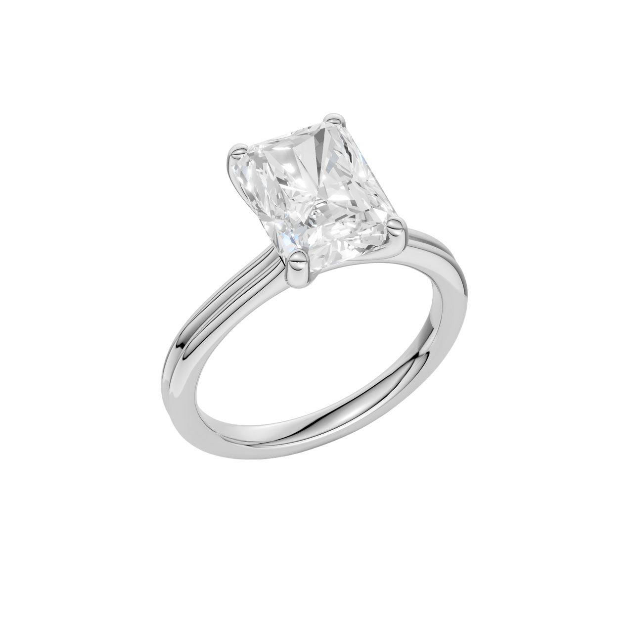 A three-quarter view of the Radiant cut diamond engagement ring in 14k white gold with a plain band and solitaire setting