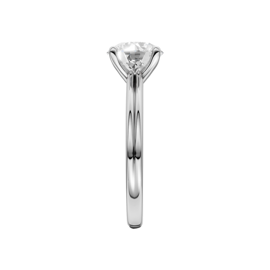 A side view of the Round cut diamond engagement ring in 14k white gold with a plain band and solitaire setting