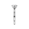 A side view of the Round cut diamond engagement ring in 14k white gold with a plain band and solitaire setting