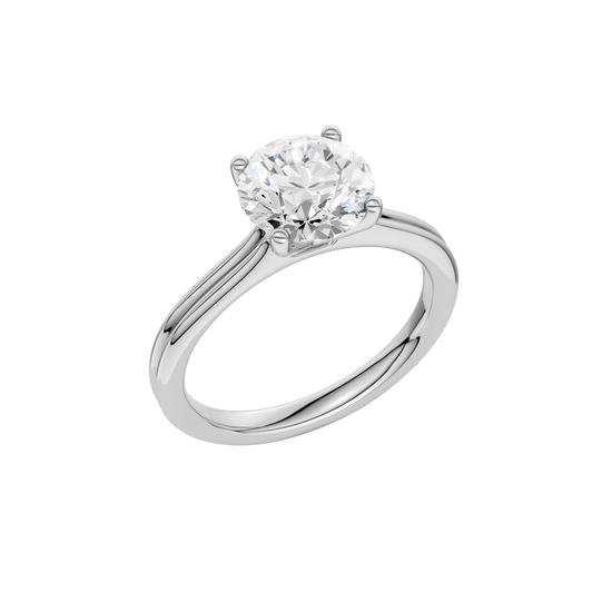 A three-quarter view of the Round cut diamond engagement ring in platinum with a plain band and solitaire setting