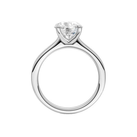 A profile view of the Round cut diamond engagement ring in 14k white gold with a plain band and solitaire setting