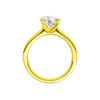 A profile view of the Round cut diamond engagement ring in 14k yellow gold with a plain band and solitaire setting