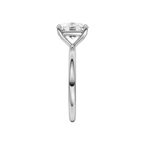 Side view of the Elongated cushion cut diamond engagement ring in platinum with a plain band and solitaire setting
