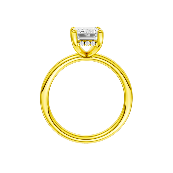 A profile view of the Emerald cut diamond engagement ring in 14k yellow gold with a plain band and solitaire setting