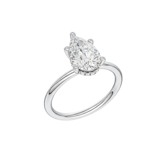 A three-quarter view of the Pear cut diamond engagement ring in platinum with a plain band and solitaire setting