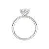 A profile view of the Pear cut diamond engagement ring in 14k white gold with a plain band and solitaire setting