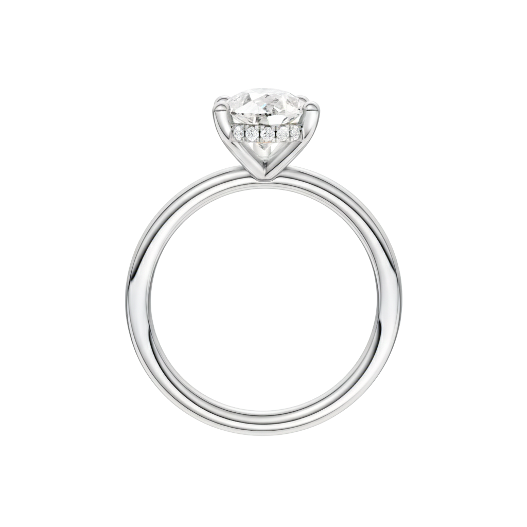 A profile view of the Pear cut diamond engagement ring in 14k white gold with a plain band and solitaire setting