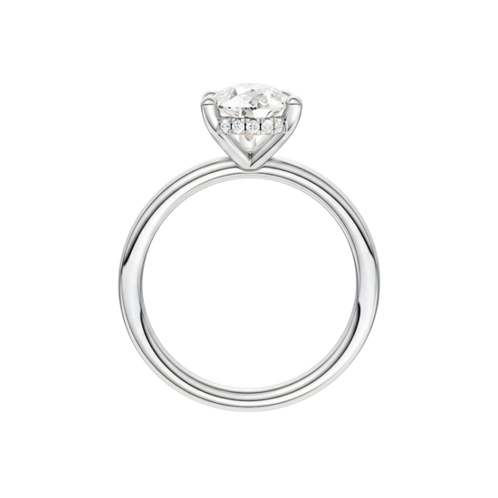 A profile view of the Pear cut diamond engagement ring in platinum with a plain band and solitaire setting