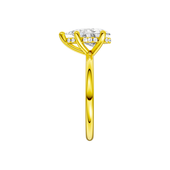 A side view of the Pear cut diamond engagement ring in 14k yellow gold with a plain band and solitaire setting