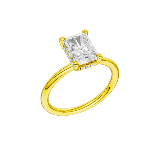 A three-quarter view of the Radiant cut diamond engagement ring in 14k yellow gold with a plain band and solitaire setting