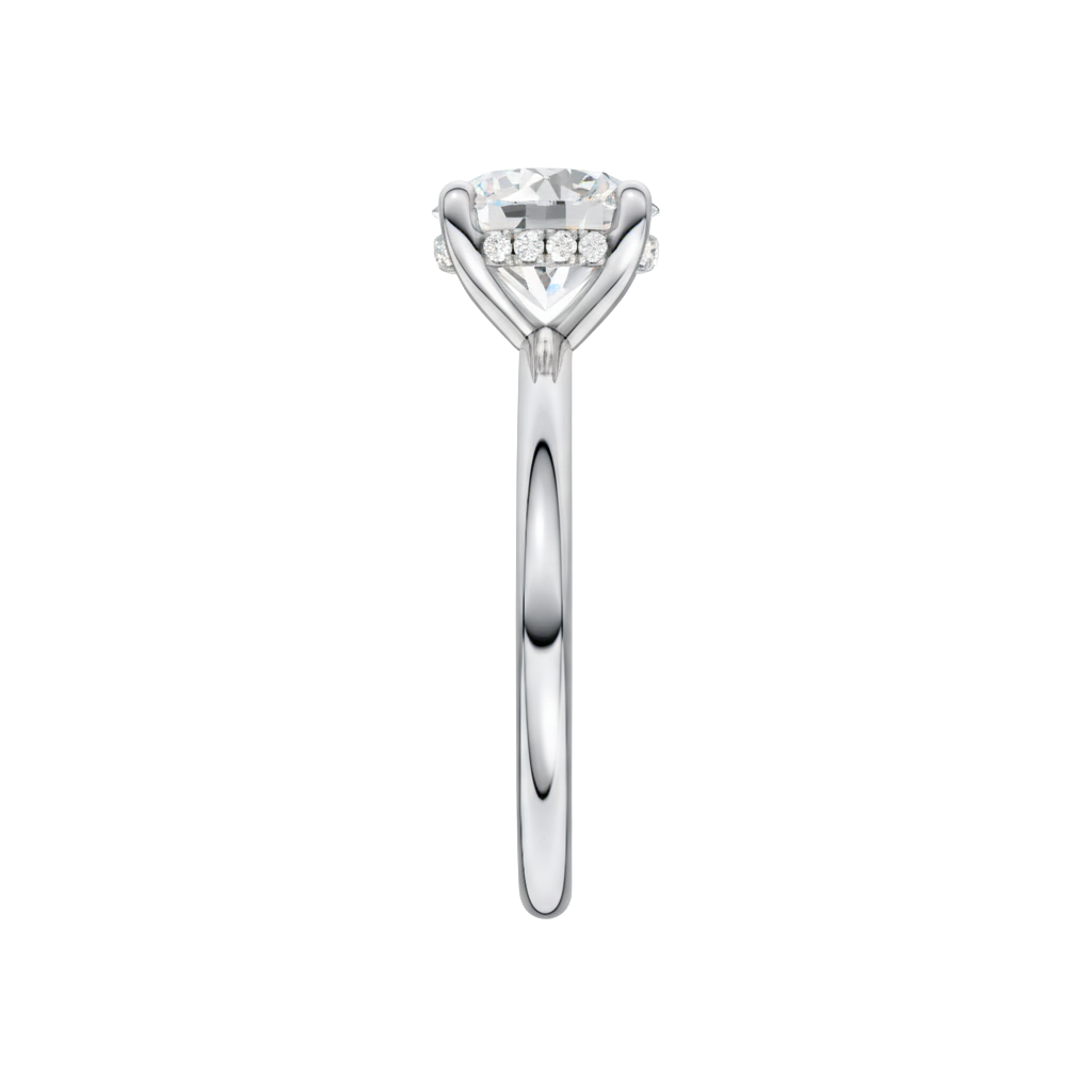 A side view of the Round cut diamond engagement ring in 14k white gold with a plain band and solitaire setting