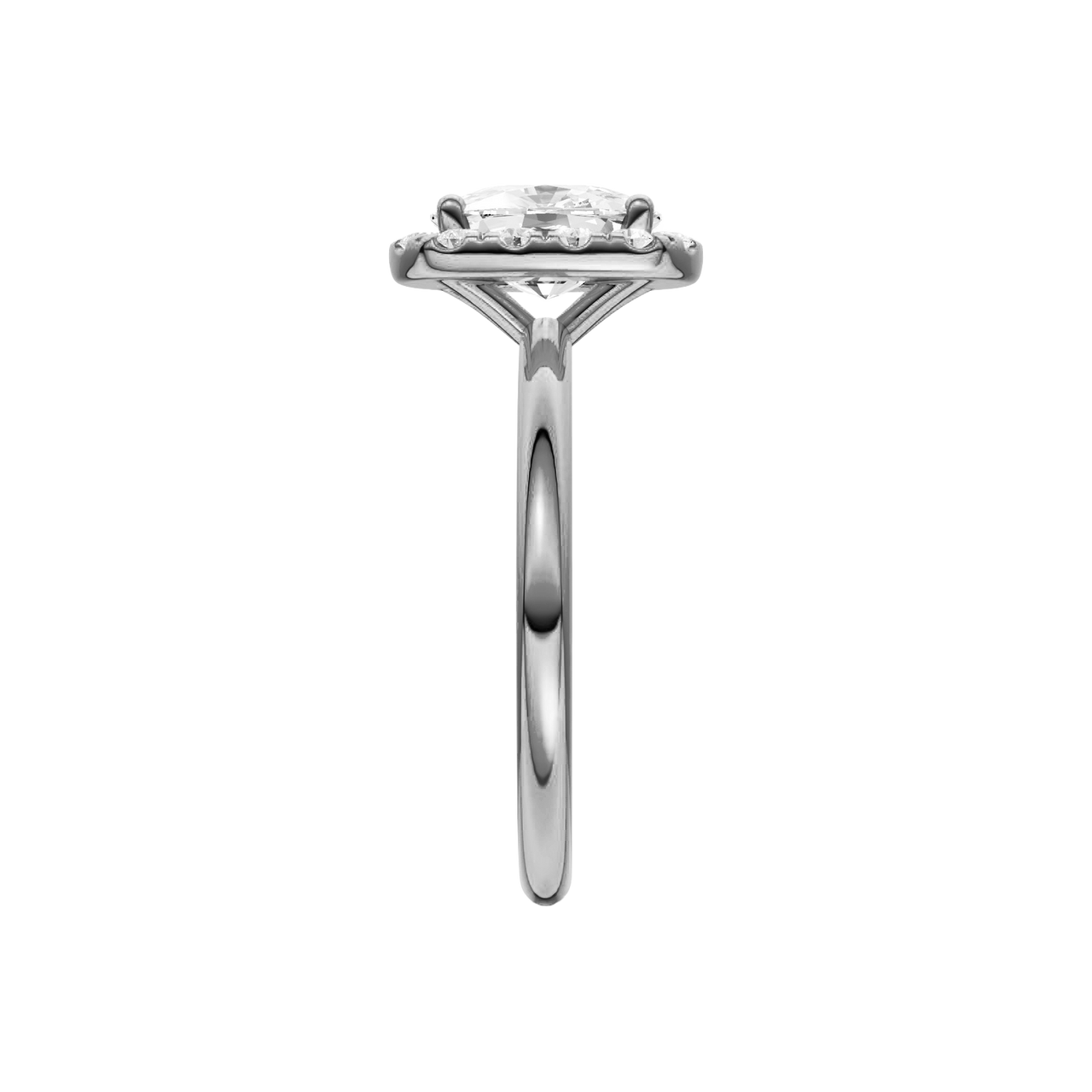 A side on view of the elongated cushion cut diamond engagement ring in 14k white gold with a plain band and solitaire setting