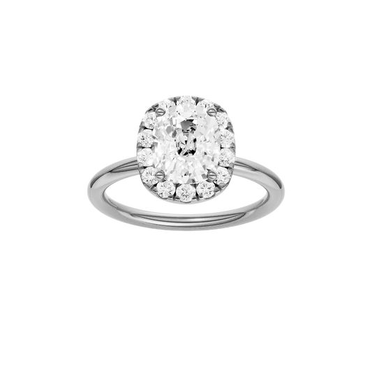 A front view of the elongated cushion cut diamond engagement ring in 14k white gold with a plain band and solitaire setting
