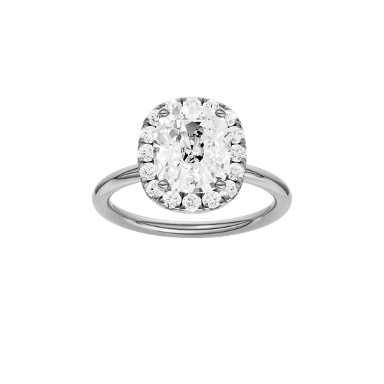 A front view of the elongated cushion cut diamond engagement ring in platinum with a plain band and solitaire setting