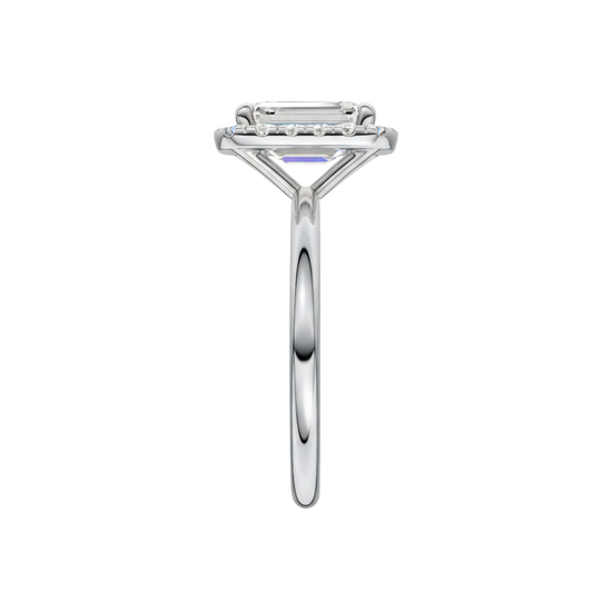 A side view of the Emerald cut diamond engagement ring in 14k white gold with a plain band and solitaire setting