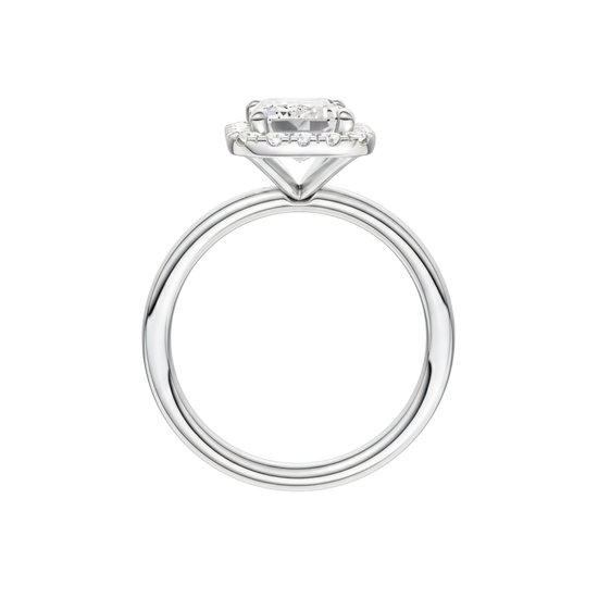 A profile view of the Emerald cut diamond engagement ring in 14k white gold with a plain band and solitaire setting