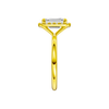 A side view of the Emerald cut diamond engagement ring in 14k yellow gold with a plain band and solitaire setting