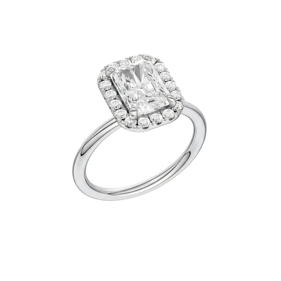 A three-quarter view of the Radiant cut diamond engagement ring in platinum with a plain band and solitaire setting