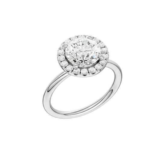 A three-quarter view of the Round cut diamond engagement ring in platinum with a plain band and solitaire setting