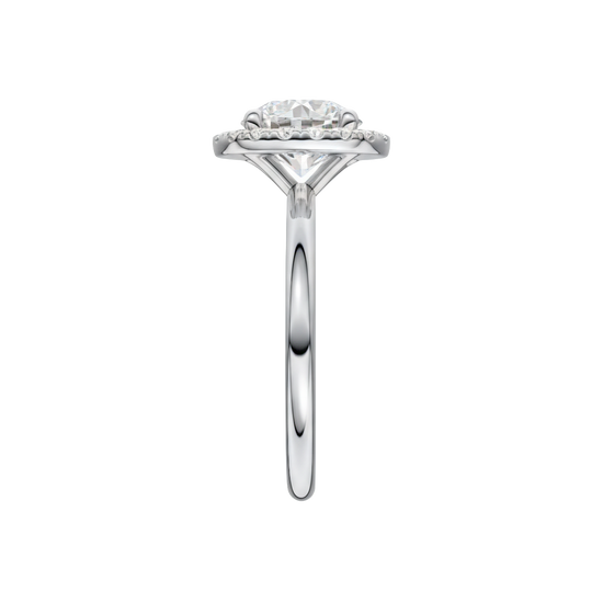 A side view of the Round cut diamond engagement ring in platinum with a plain band and solitaire setting