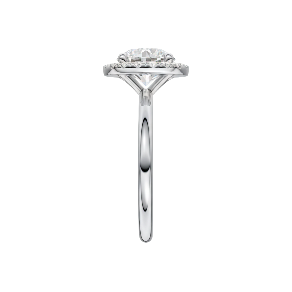 A side view of the Round cut diamond engagement ring in platinum with a plain band and solitaire setting