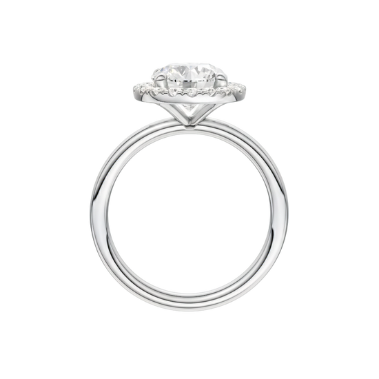 A profile view of the Round cut diamond engagement ring in 14k white gold with a plain band and solitaire setting