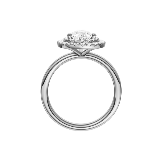 A profile view of the Pear cut diamond engagement ring in 14k white gold with a plain band and solitaire setting