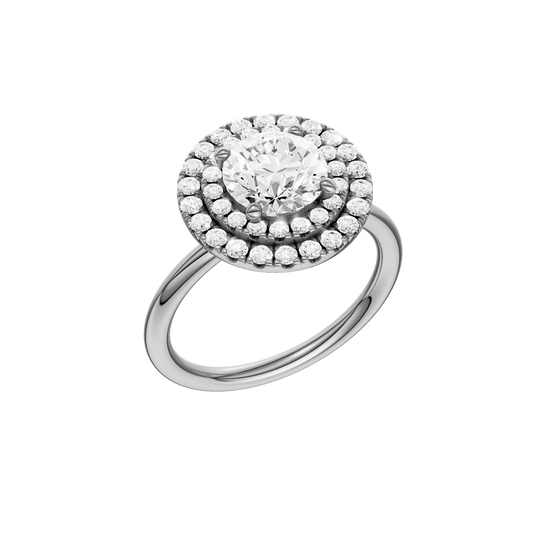 A three-quarter view of the Round cut diamond engagement ring in platinum with a plain band and solitaire setting