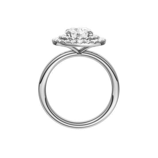 A three-quarter view of the Round cut diamond engagement ring in platinum with a plain band and solitaire setting
