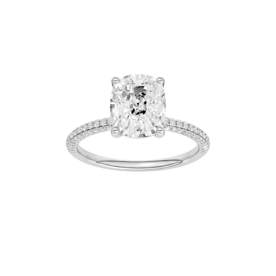 A front view of the Elongated Cushion cut diamond engagement ring in 14k white gold with a pavé diamond band and cathedral setting