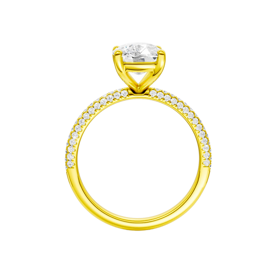 A profile view of the Elongated Cushion cut diamond engagement ring in 14k yellow gold with a pavé diamond band and cathedral setting
