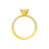 A profile view of the Marquise cut diamond engagement ring in 14k yellow gold with a pavé diamond band and cathedral setting