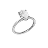 A three-quarter view of the oval cut diamond engagement ring in 14k white gold with a pavé diamond band and cathedral setting