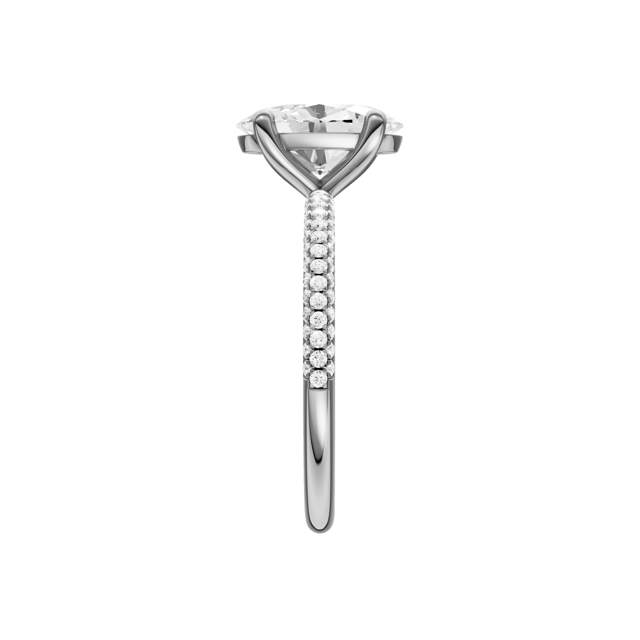 A side view of the oval cut diamond engagement ring in platinum with a pavé diamond band and cathedral setting