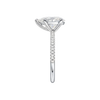 A side view of the Pear cut diamond engagement ring in platinum with a pavé diamond band and cathedral setting