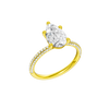 A three-quarter view of the Pear cut diamond engagement ring in 14k yellow gold with a pavé diamond band and cathedral setting