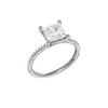 A three-quarter view of the Princess cut diamond engagement ring in platinum with a pavé diamond band and cathedral setting
