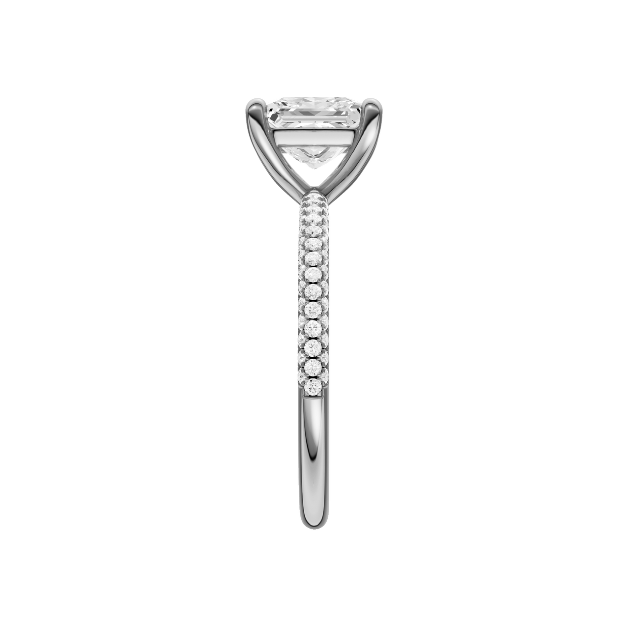 A side view of the Princess cut diamond engagement ring in platinum with a pavé diamond band and cathedral setting