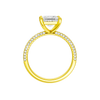 A profile view of the Princess cut diamond engagement ring in 14k yellow gold with a pavé diamond band and cathedral setting