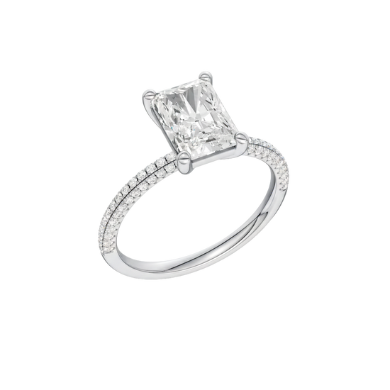 An angled view of 14K white gold Amorati Alight radiant diamond solitaire with cathedral setting and pavé band